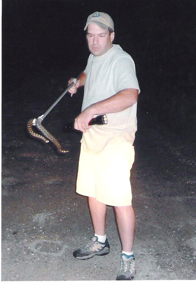 Aaron wrangling a Massasagua