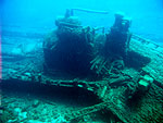 Boiler, steam drum and engine with collapsed deck.
