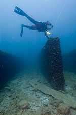 Diver above centerboard trunk.