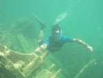 Diver examining the engine mounts.