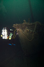 Diver inspecting the bow.