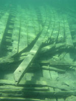 Internal wooden arch along starboard side. 