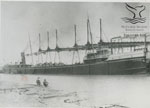 Steel hulled vessel loading.