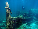 Sternpost and boiler with diver above.