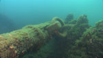 Wooden anchor stock at bow. 